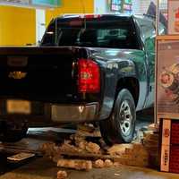 <p>The pickup crashed through the front doors of the Quick Stop on Patterson Street in Hillsdale.</p>