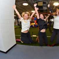 <p>Members of the A-Game Sports staff at the grand opening celebration in New Rochelle.</p>