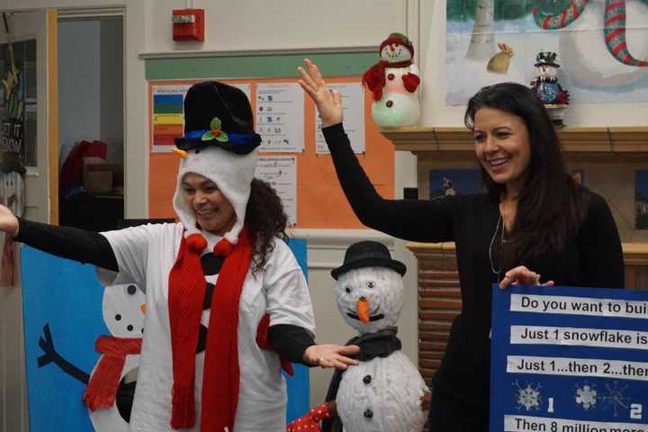 Pre-kindergarten and kindergarten students enjoyed hearing the book &quot;Snowmen at Night&quot; read aloud while watching adults act out the story.