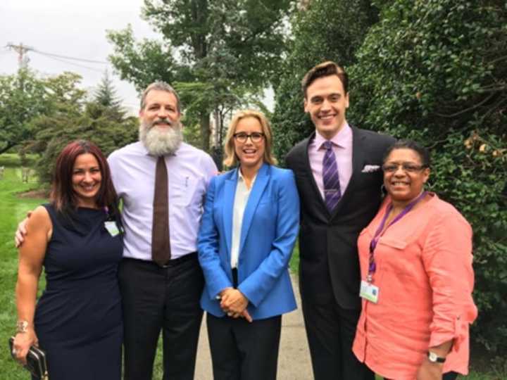 Stars of CBS-TV&#x27;s &quot;Madam Secretary,&quot; including Tea Leoni, with staff members at Wartburg in Mount Vernon.