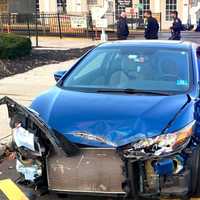 <p>A tow truck removed the seriously damaged vehicle.</p>