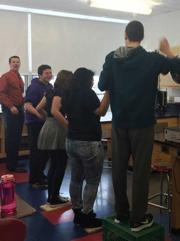 Westwood Physics Students Experiment With Van de Graaf Generator
