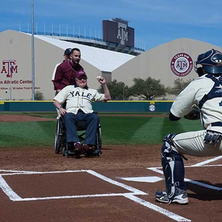 Former U.S. President George H.W. Bush throws out the ceremonial first pitch to Don Bosco graduate Andrew Herrera.