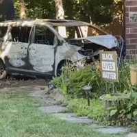 <p>The van struck the house and burst into flames.</p>