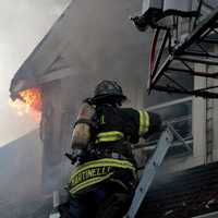 <p>The second and third stories were fully involved soon after the fire broke out.</p>