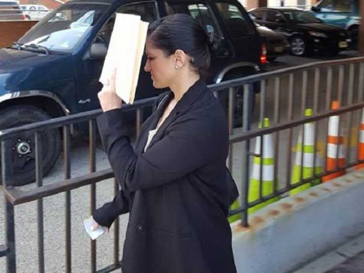 Jennifer Caruso (Cook) leaving Central Municipal Court in Hackensack after her plea bargain.