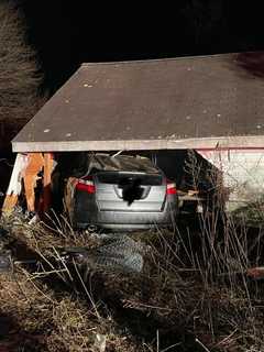 Man Suffering Medical Emergency Crashes Into Garage In Area