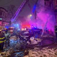 <p>Firefighters battled frozen hydrants and slippery conditions.</p>