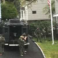 <p>Outside Assistant Passaic County Prosecutor Sergio Mello Jr.&#x27;s Woodland Park home.</p>