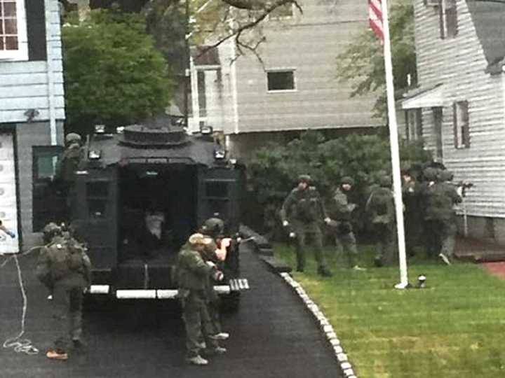 Outside Assistant Passaic County Prosecutor Sergio Mello Jr.&#x27;s Woodland Park home.