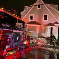 <p>Hempstead firefighters at work.</p>