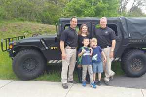 Weston Chief, Detective Give First-Graders A Lift To School