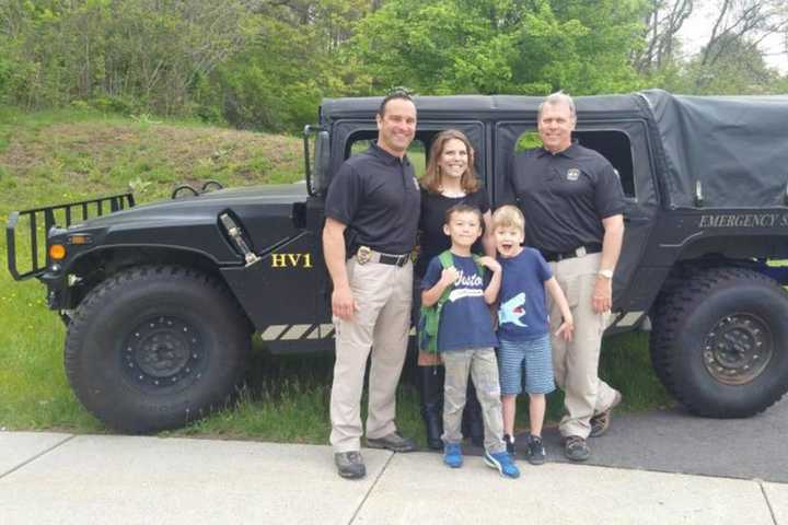 Weston Chief, Detective Give First-Graders A Lift To School