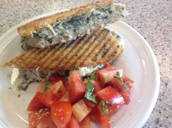 A Lunch Special this week at Crumbs Gourmet Bakery: Fresh Spinach and Artichoke Grilled Cheese with Tomato Basil Salad