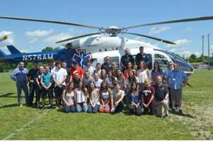 Helicopter Lands On Mahopac High School Field To Congratulate EMT Students