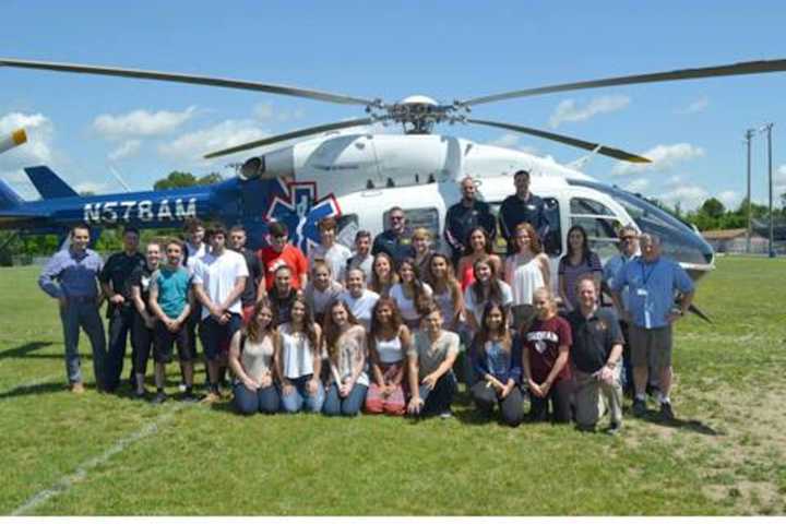 Helicopter Lands On Mahopac High School Field To Congratulate EMT Students
