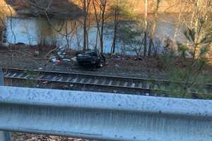 CT Man Killed After Vehicle Flips Over Railroad Tracks, Police Say