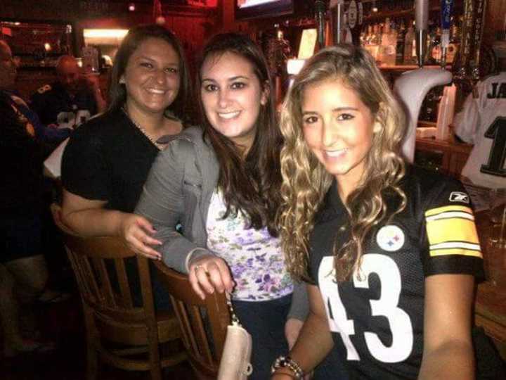 From left: Ashely Collazo, Jess Mirto and Vitoria Bernardes sit at the bar at Michael&#x27;s Tavern.