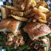 <p>Tasty sliders and fries from Off The Hook.</p>