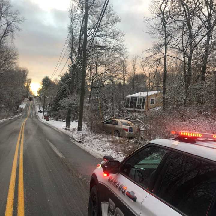 Police are warning drivers that slick roads are causing a number of crashes. This vehicle hit a telephone pole in Ramapo.