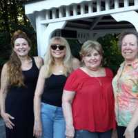 <p>Diane Tagliabue, second from left, of Elmwood Park with friends at the Paramus Cameo Concert.</p>