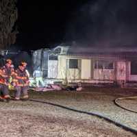 <p>Crews responded to Cooper Folly and Grant roads to find a mobile home engulfed in flames with reports of people trapped around 6:20 p.m.</p>