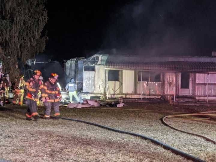 Crews responded to Cooper Folly and Grant roads to find a mobile home engulfed in flames with reports of people trapped around 6:20 p.m.