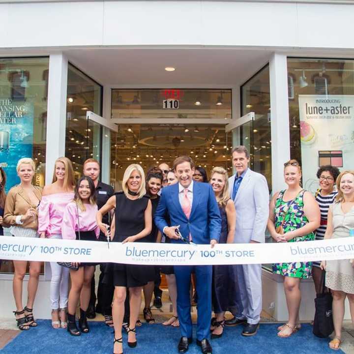 Bluemercury Marla Malcolm Beck (CEO) and Barry Beck (COO) cut the ribbon on the store&#x27;s 100th location with its cofounders.