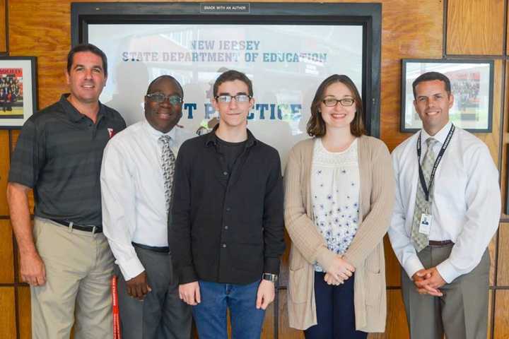 Bergenfield Graphic Design Student Brands Logo For Library