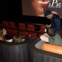 <p>Sommelier/executive bartender Adam Seger displays a bottle of Cipi wine (iPic spelled backward)</p>