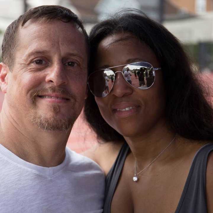 Kerry James Rivera, left, with wife Rena Mason Rivera.