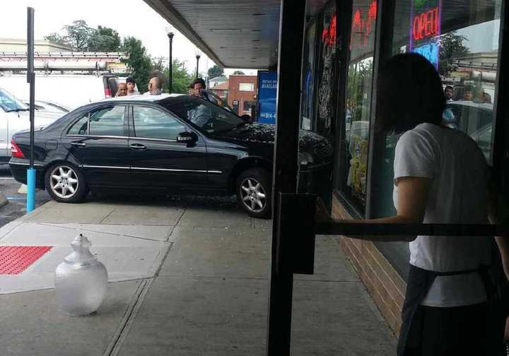 A lamp was knocked from its post in the crash.