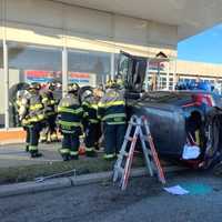 <p>Firefighters at the scene of the crash in Hackensack.</p>