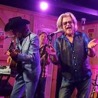 <p>Daryl Hall sings &quot;You Make My Dreams Come True,&quot; with Marty Stuart, right, Kenny Vaughn (in hat) and Shane Theriot.</p>