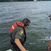 <p>Officers and a medic rescued a boater whose kayak had sunk off the coast of Greenwich this weekend.</p>