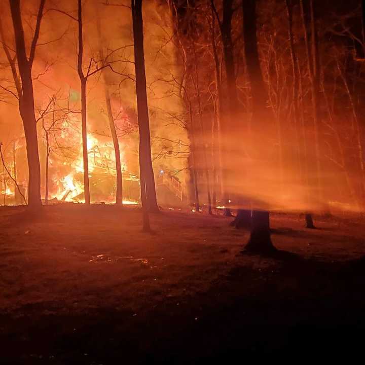 An overnight blaze collapsed a two-story home.