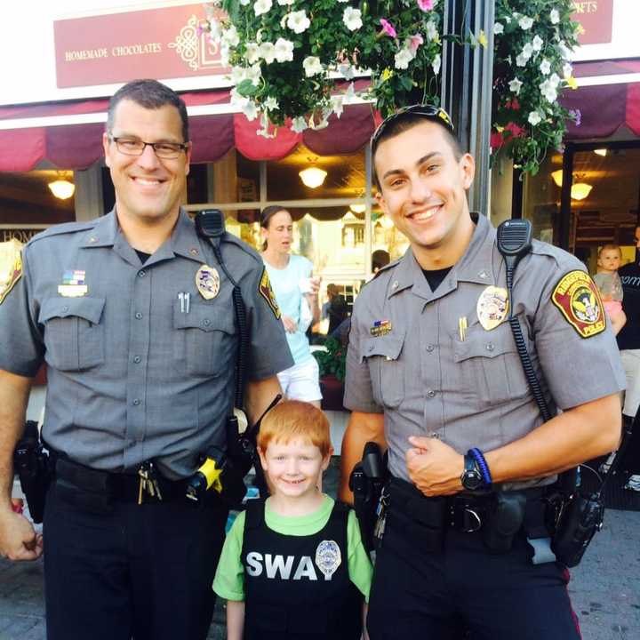 Police interact with children at the event.