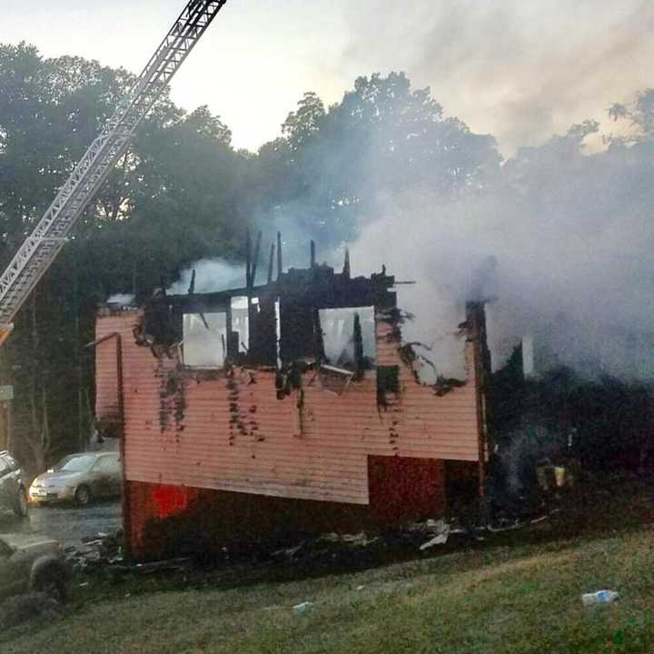 The family was able to escape the fire uninjured at this house at 2 Flak Lane in New Fairfield on Saturday evening.