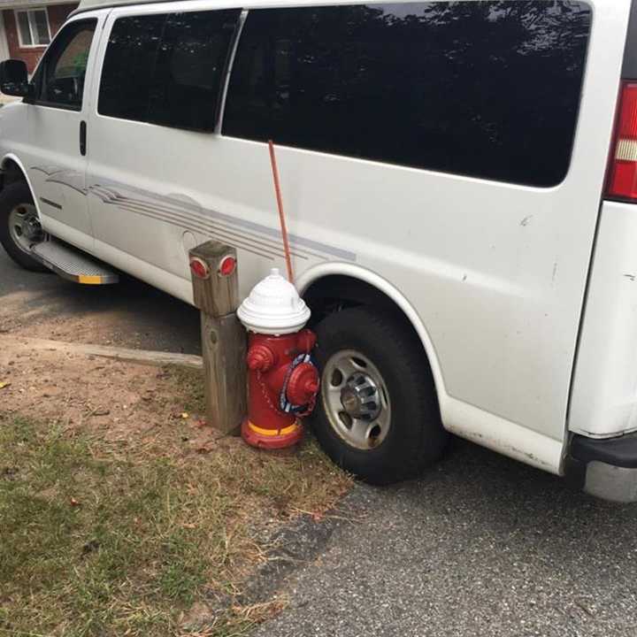 A Ramapo driver hit a fire hydrant will trying to pull into a driveway.