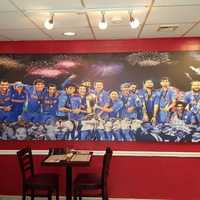 <p>Cricket photos hang on the walls of Silli Point Indian Fusion in Cliffside Park.</p>