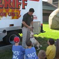 <p>K9 Scooter shown with his handler Deputy Brad Lerner recently passed away. He served as part of the arson unit.</p>