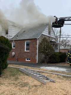 Three Rescued From Long Island House Fire By Police Officer