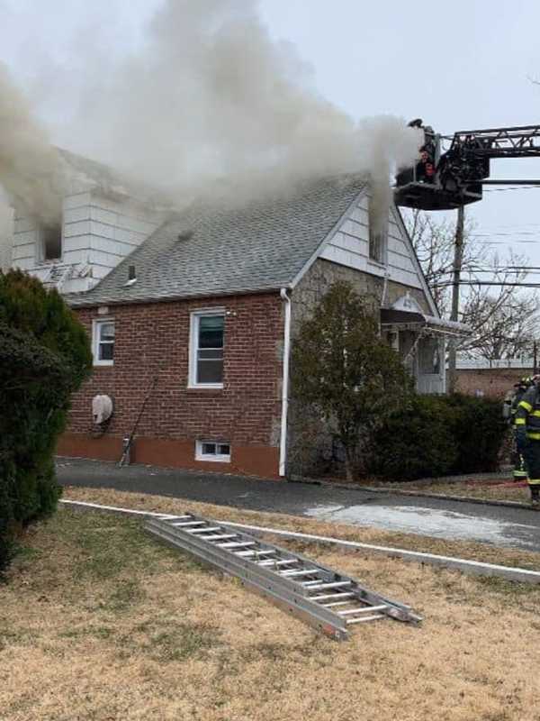 Three Rescued From Long Island House Fire By Police Officer