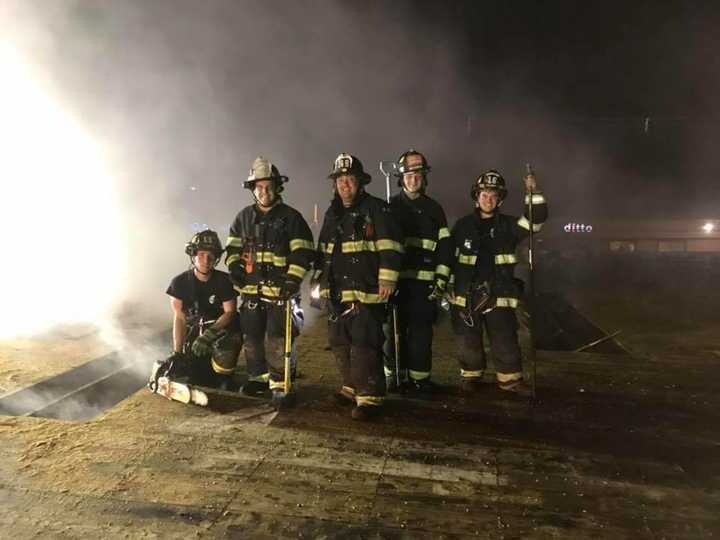 Franklin Lakes volunteer firefighters in action. The department will be holding an open house on Nov. 21 to bolster its membership.