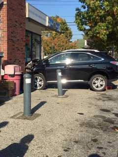 Car Crashes Into Building In Croton
