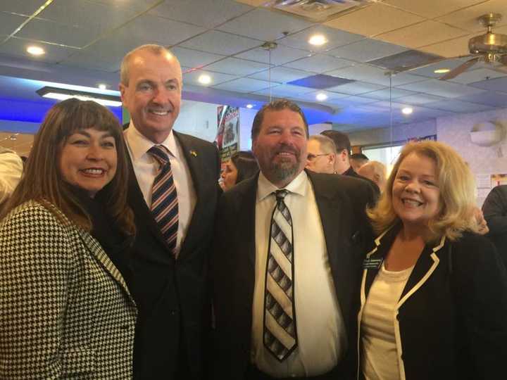 Germain M. Ortiz (far left), Mary Amoroso (far right), Thomas J. Sullivan (second from right)