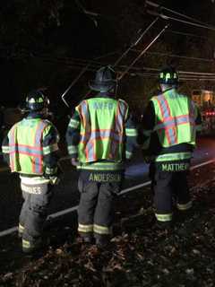 Monroe Firefighters Rescue Adult, Child After Rollover Car Crash