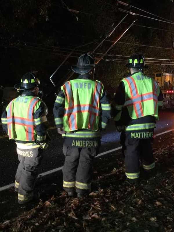 Monroe Firefighters Rescue Adult, Child After Rollover Car Crash