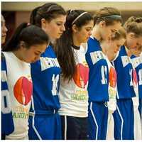 <p>Saddle River Day School and Newtown High School athletes share a moment of silence to remember the 26 victims killed in the Sandy Hook Shooting.</p>