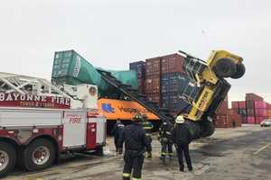 Firefighters Extricate Crane Operator When Machine Topples In Bayonne